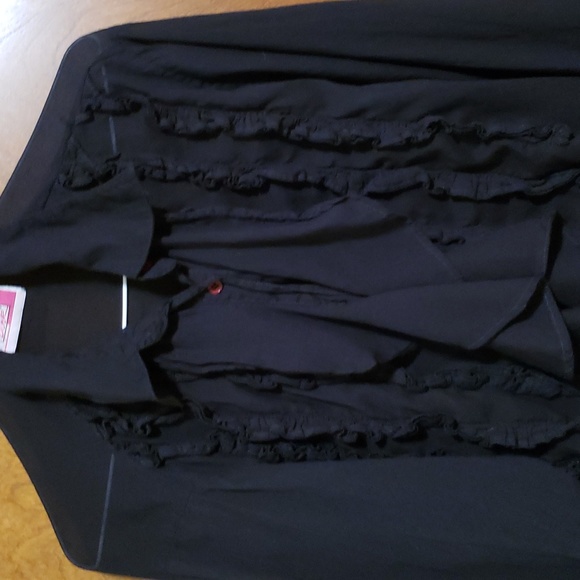 Sheer black button down shirt with ruffled chest and cuffs. - Picture 2 of 4